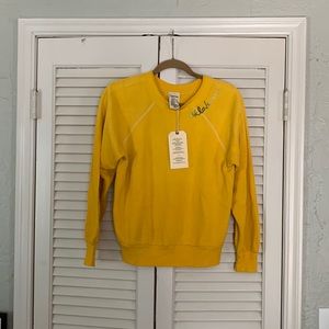 Hand stitched sweatshirt with Oklahoma on shoulder.